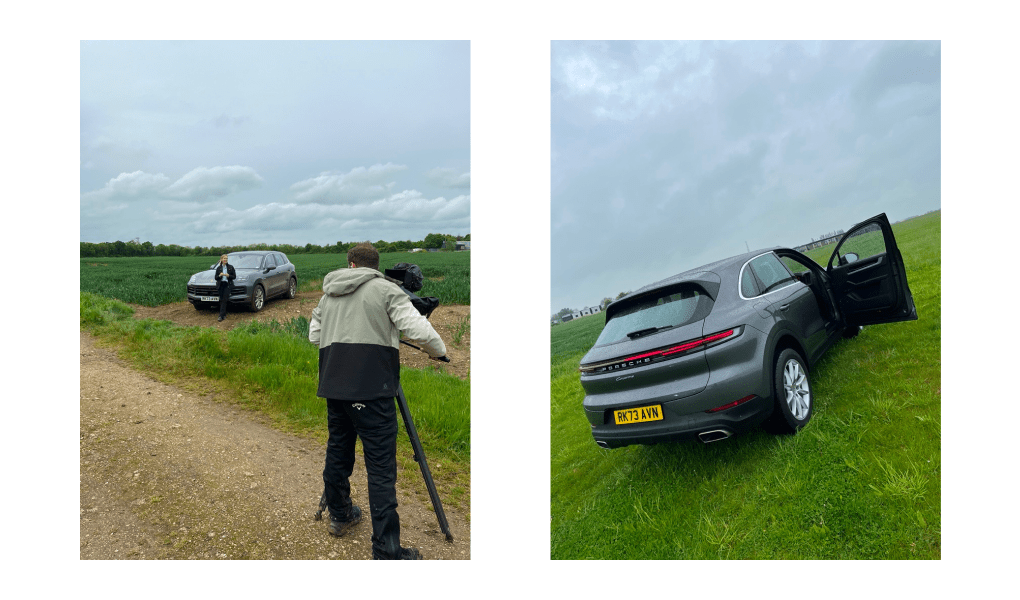 Hinter-den-Kulissen eines Porsche Cayenne Video-Drehs mit Moderatorin, Kameramann und dem SUV vor einer malerischen Landschaftskulisse.